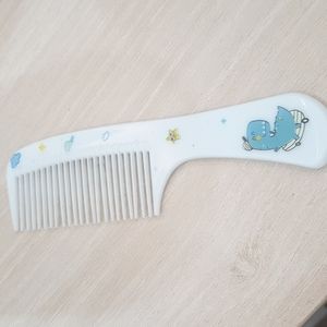 Small white comb for children with simple patterns